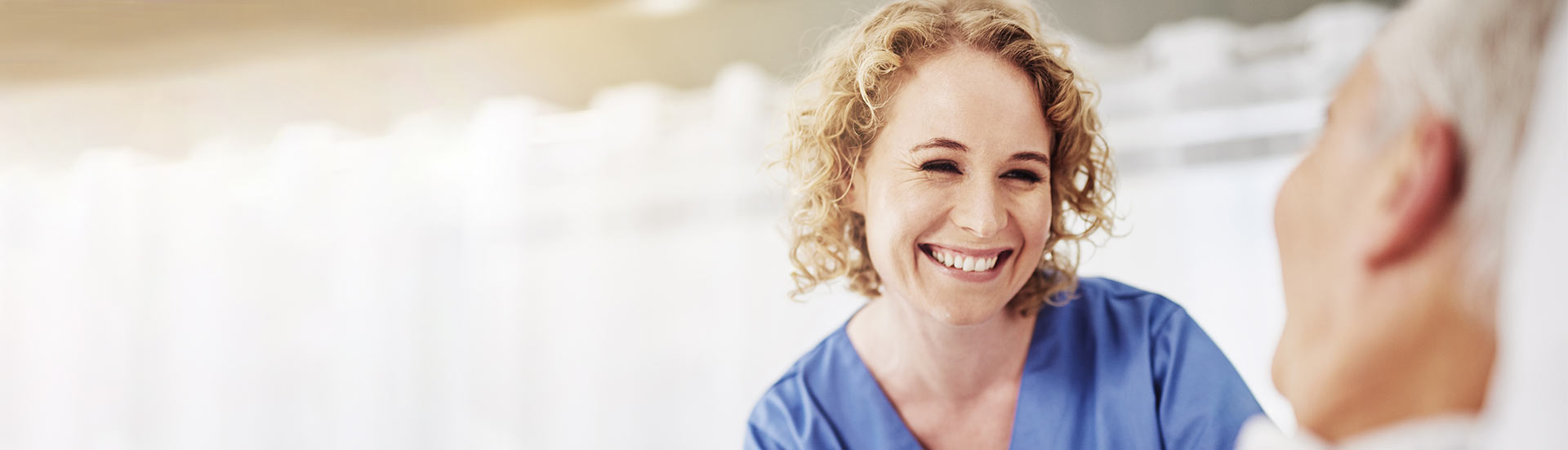 nurse smiling at patient
